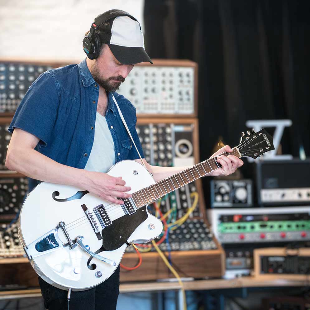 Founder with Gretsch guitar